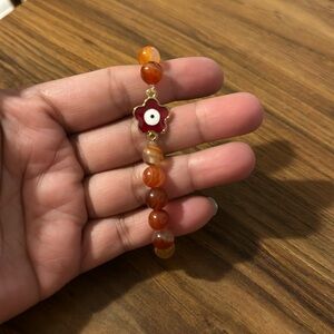 Garnet evil eye bracelet